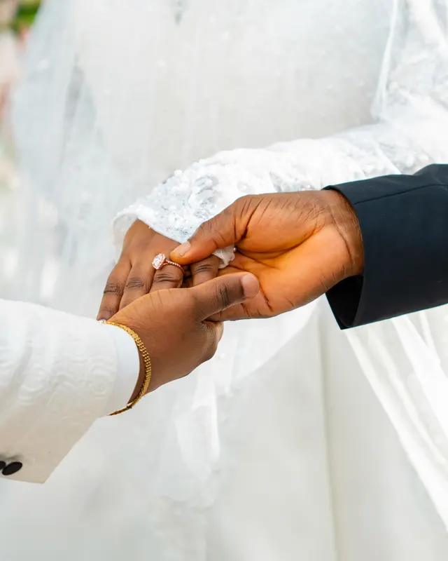 Newlyweds holding hands