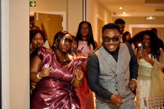 Guests joining the newlyweds on the dance floor
