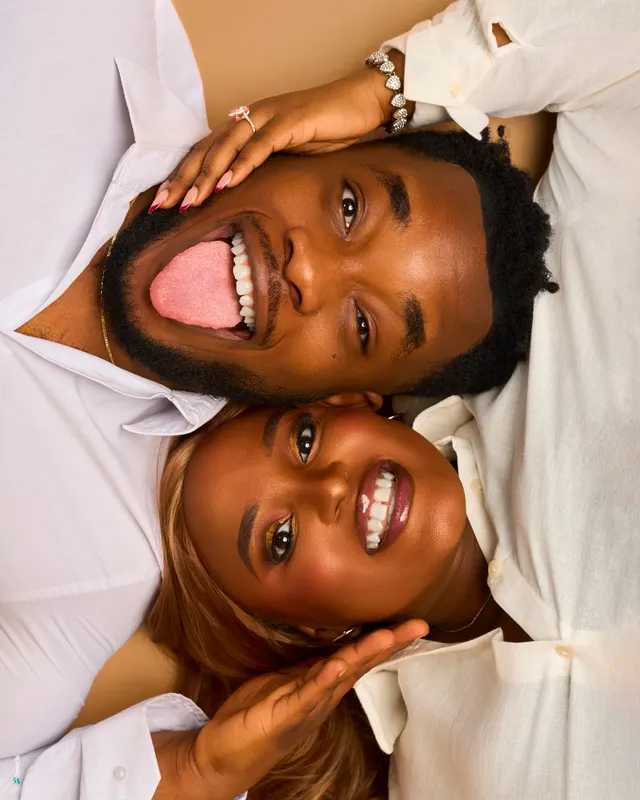 A couple lying together during their portrait session