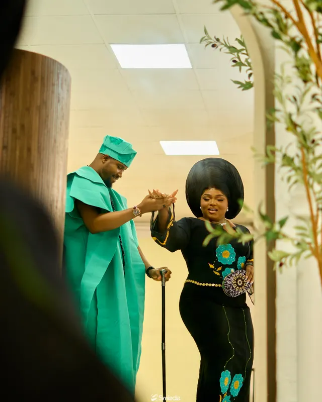 Paul lifting Precious’s veil